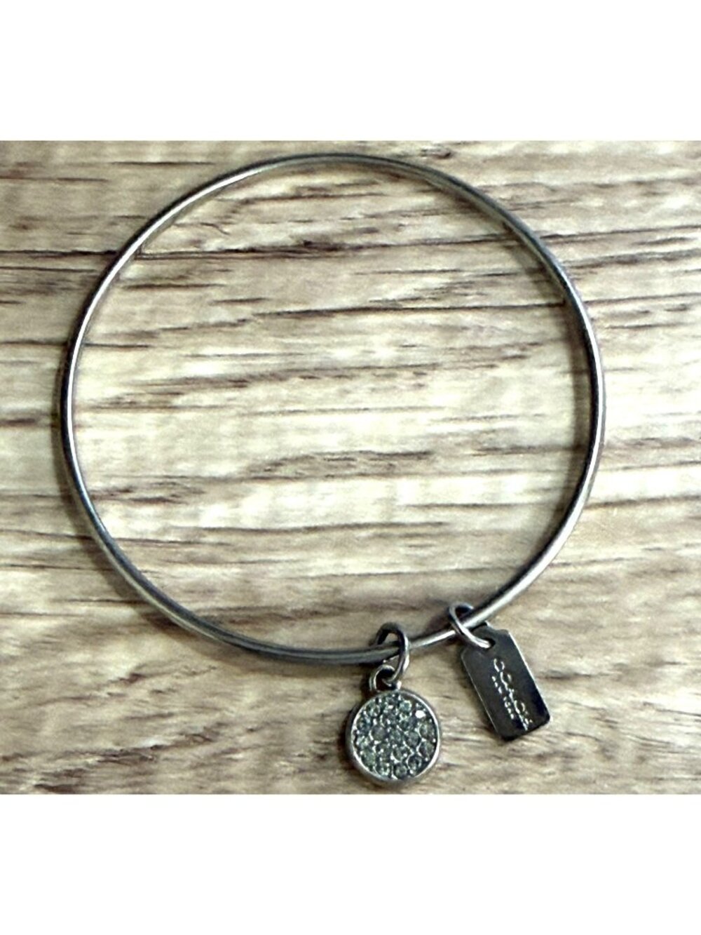 Coach Pave Crystal Round Dangle Charm Silver Tone Slip-On Bangle Bracelet OSFM